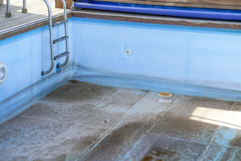 Empty dry swimming pool preparing for cleaning Frederick, MD & Springfield, VA