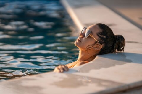 Woman relaxing in the pool