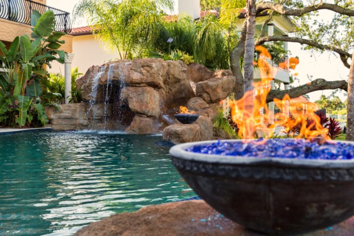 Fire Pots and Water Fall at a Custom Pool in VA, DC, and MD