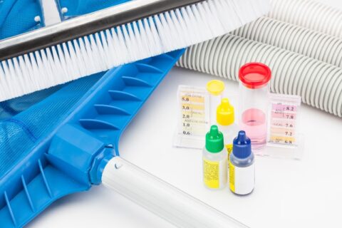 Pool Chemicals Are Being Added to a Pool for Winterization in Virginia & Maryland