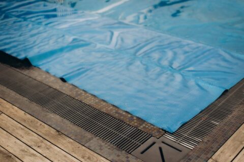 Blue Pool Cover Lying Over a Swimming Pool in Virginia & Maryland