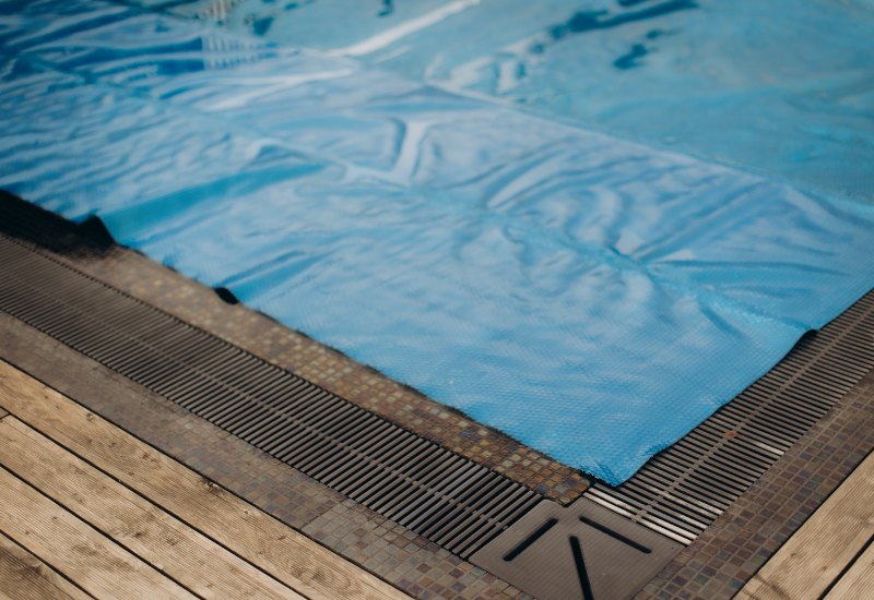 Blue Pool Cover Lying Over a Swimming Pool in Virginia & Maryland