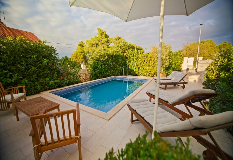 Small Outdoor Saltwater Swimming Pool with Lounge Chairs in Virginia & Maryland