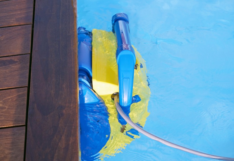 Robotic Pool Cleaner Is Cleaning the Walls of a Residential Pool in Virginia & Maryland